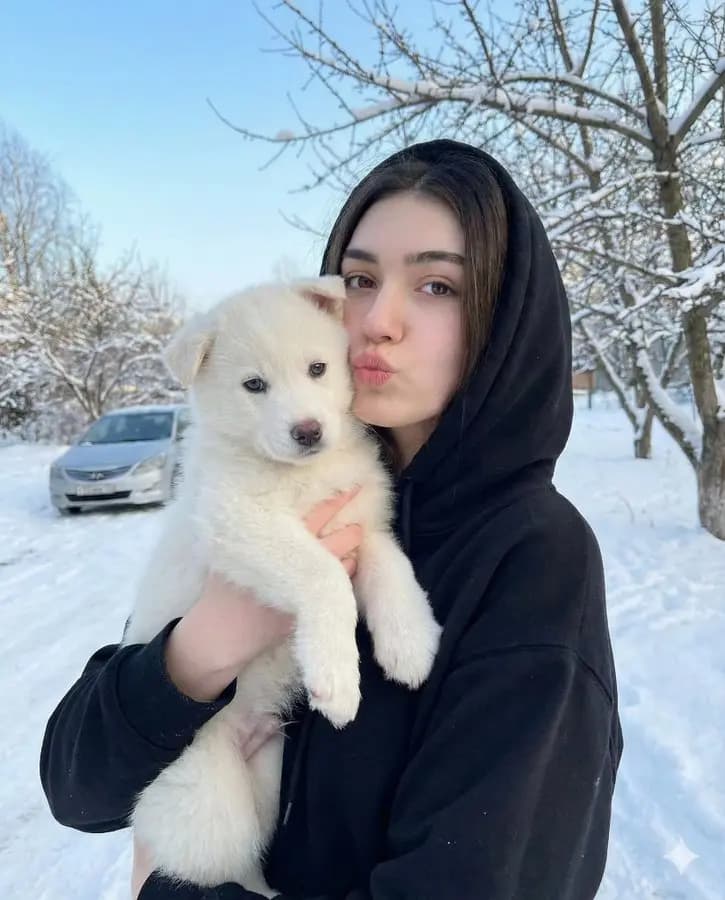 Portrait with Puppy in Snow — example output